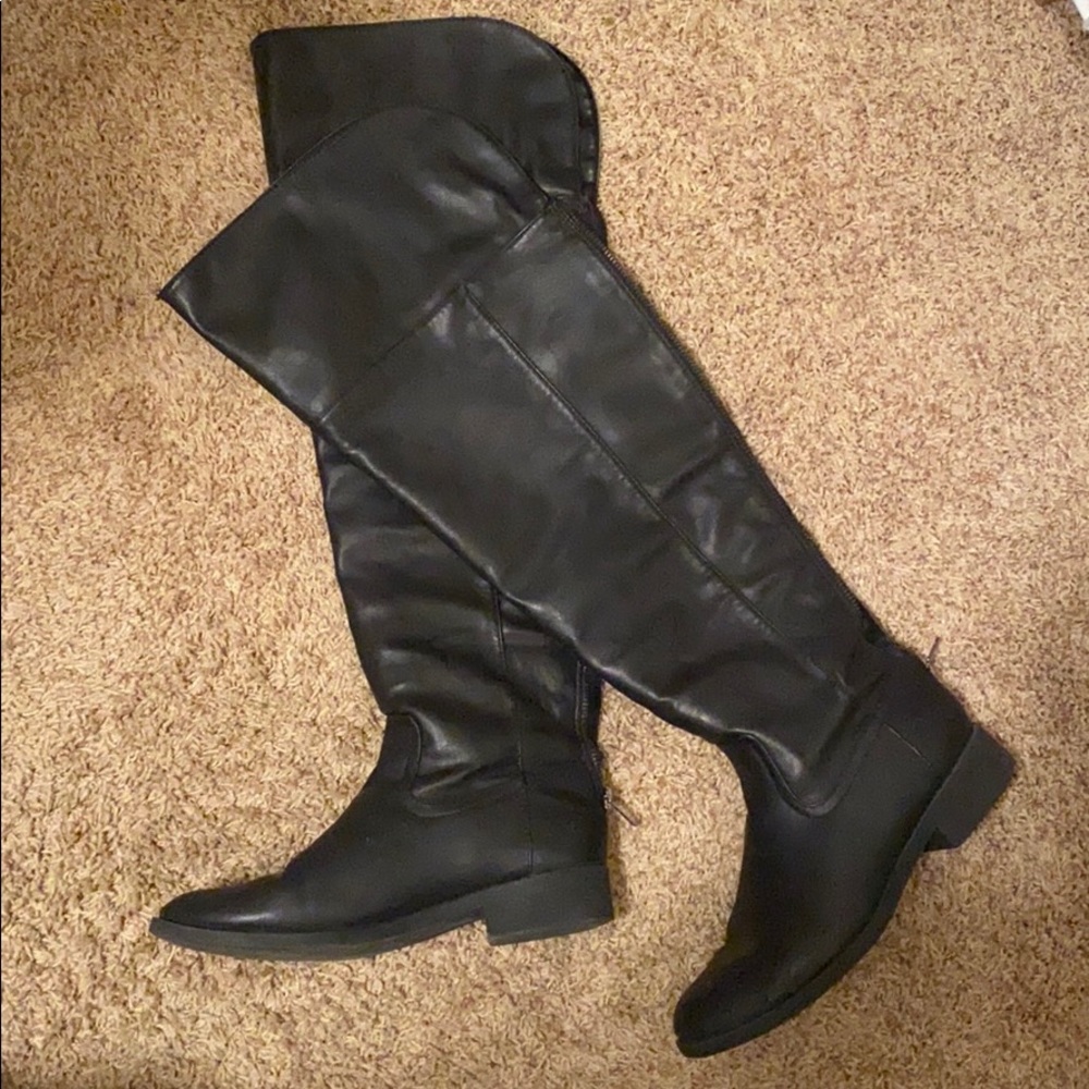 Above the knee black boots